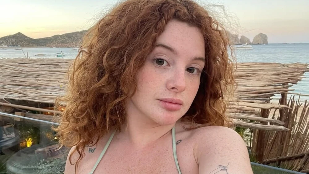 Briggitte Bozzo smiling confidently, representing her rising net worth in 2025